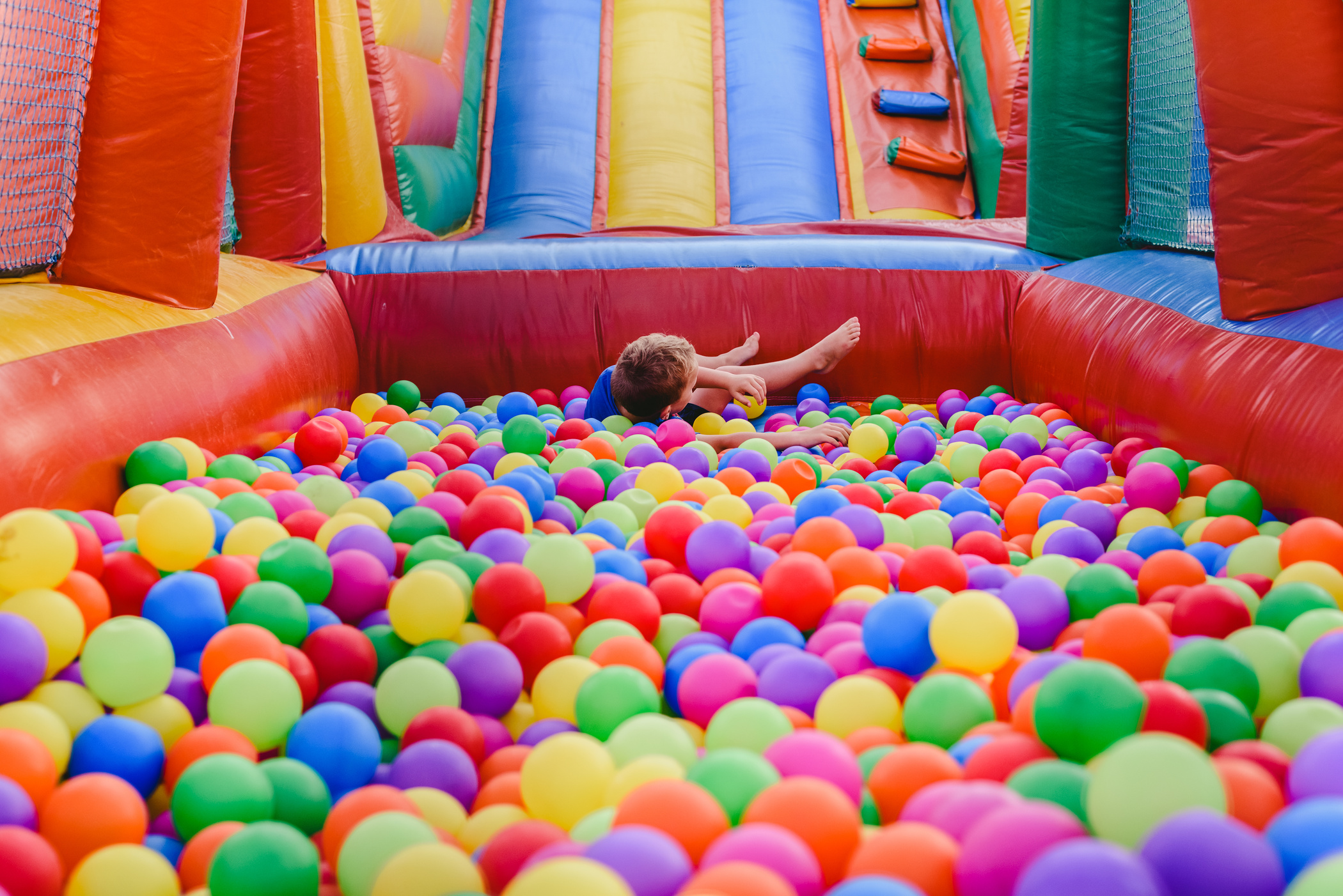 Inflatable Castle Full of Colored Balls for Children to Jump